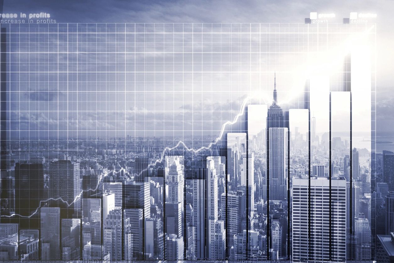 Double explosure with business chart and skyline